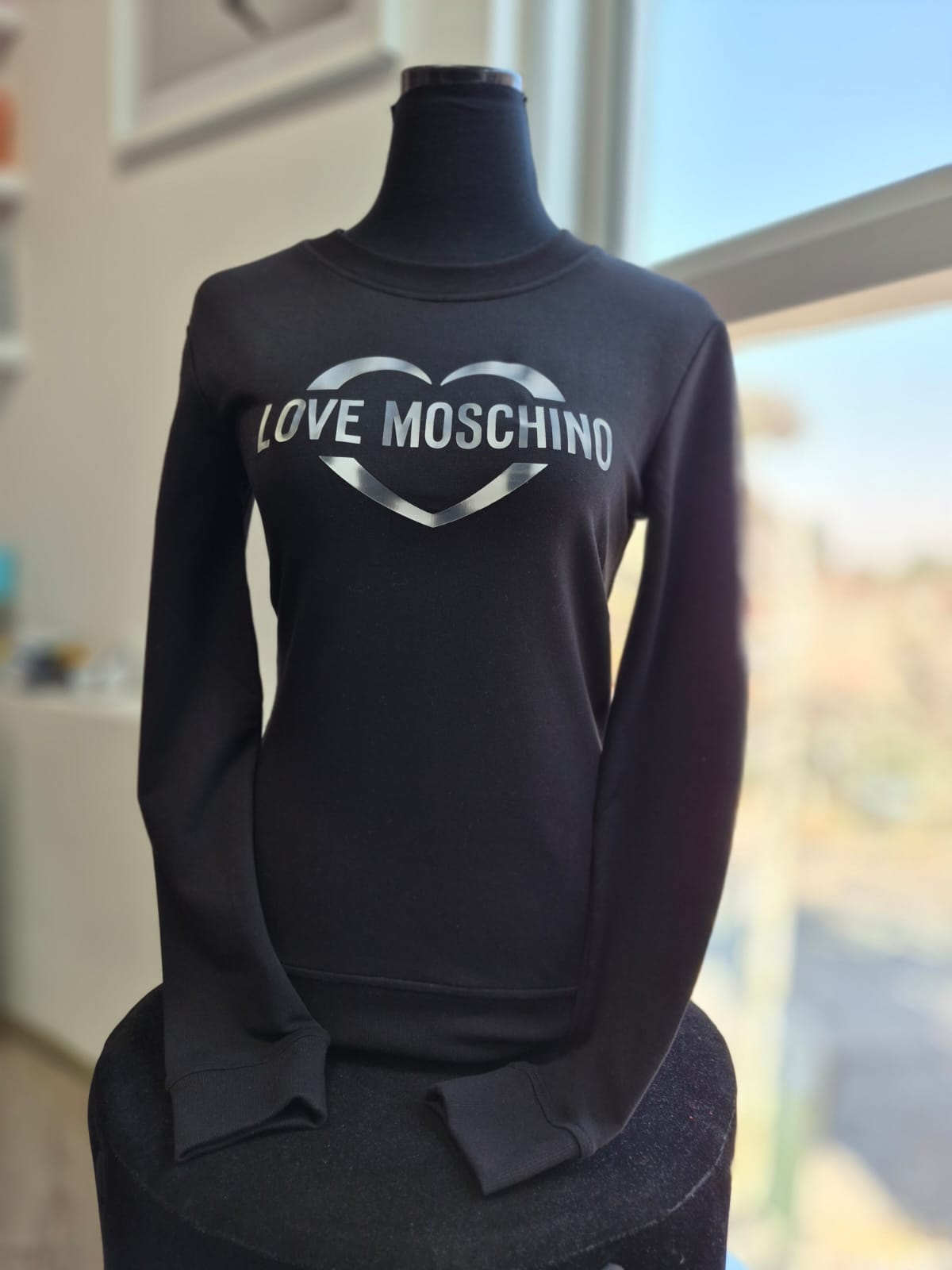 Polerón Moschino