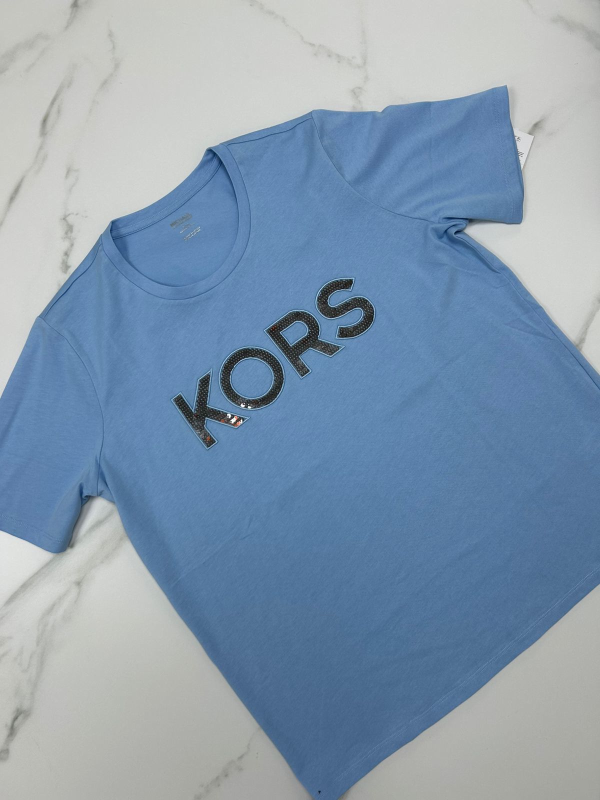 Polera celeste Michael Kors
